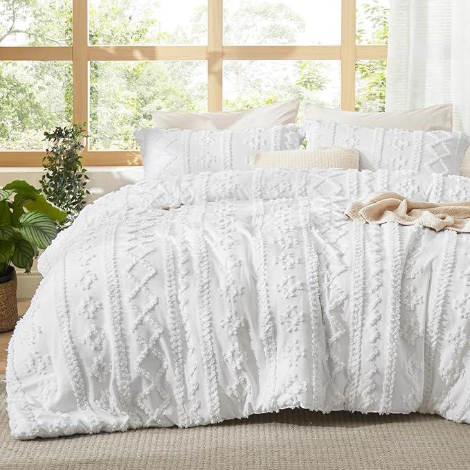 White-on-white tufted duvet cover set with subtle geometric texture
