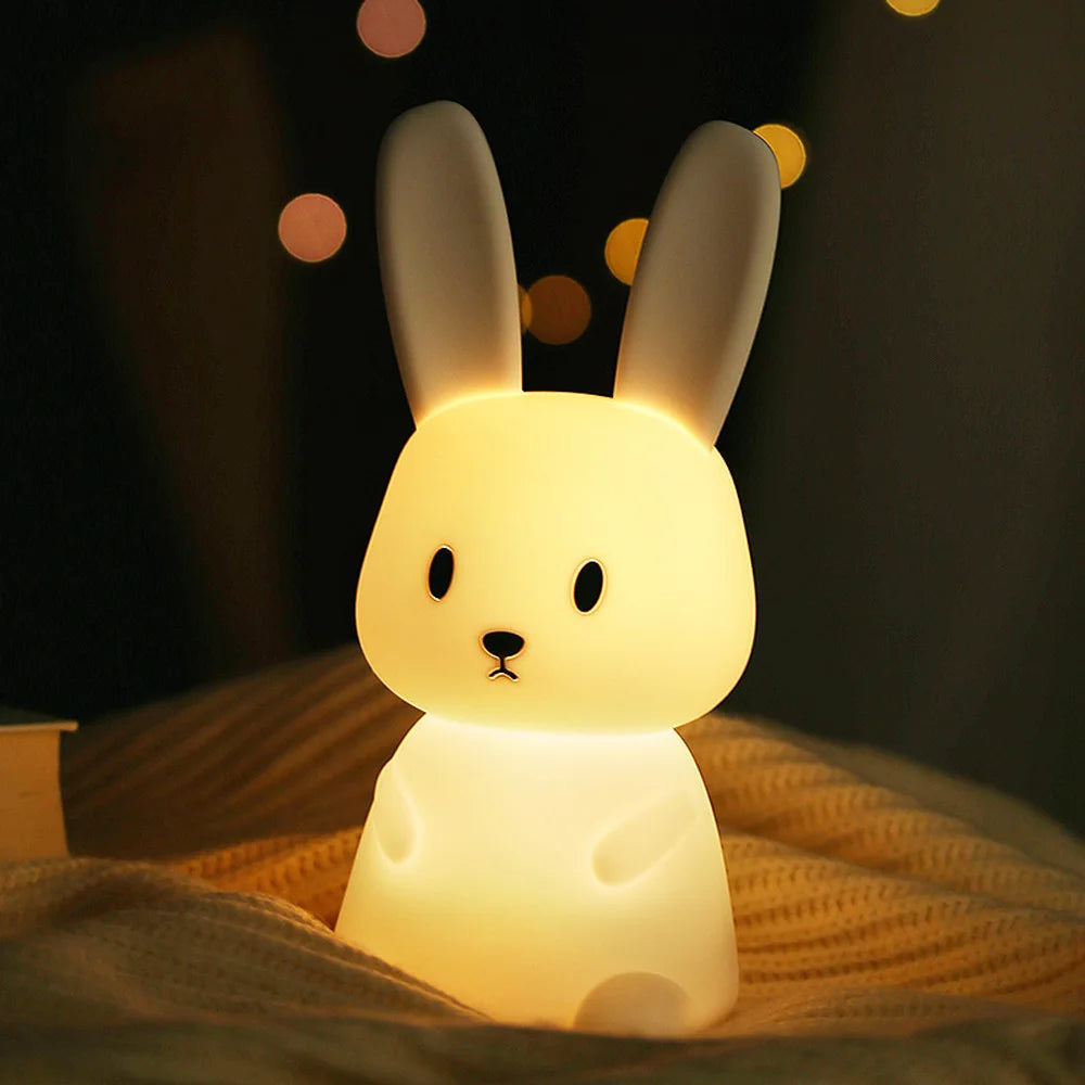 Matte white rabbit LED night lamp with touch sensor and warm light