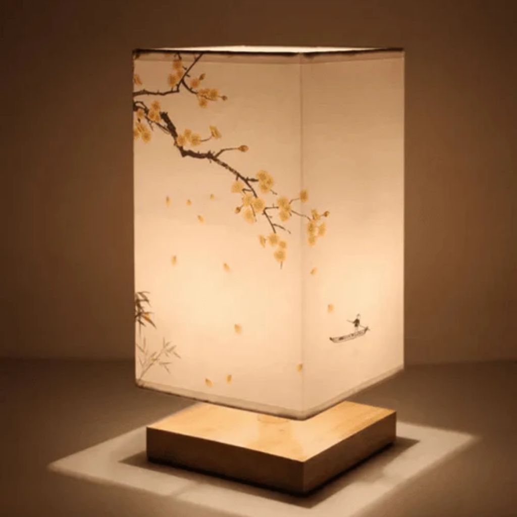 Minimalist Wood Base Lamp with golden cherry blossoms and bamboo accents on fabric