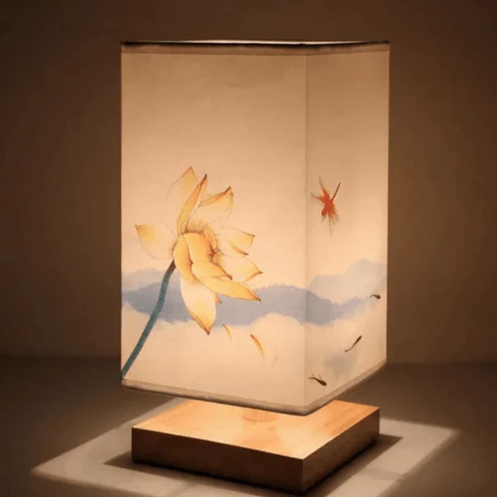 Front view of Lotus Flower Asian Decor Table Lamp with soft blue mountain details