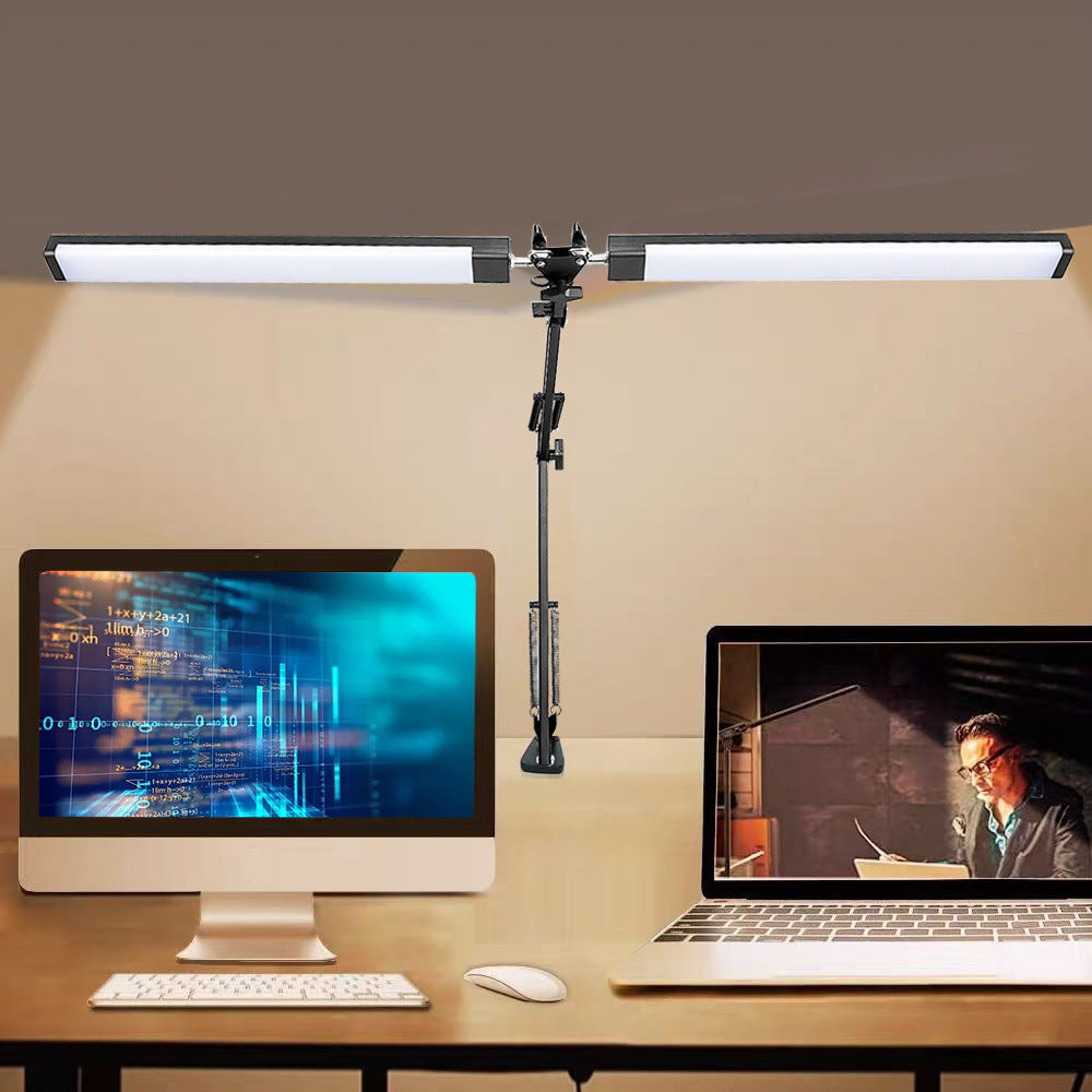 Adjustable swing arm black LED task light for multi-monitor workspace setup
