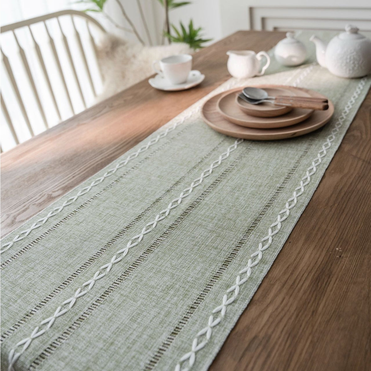 Elegant White Christmas Table Runner with Braided Design and Tassels 1
