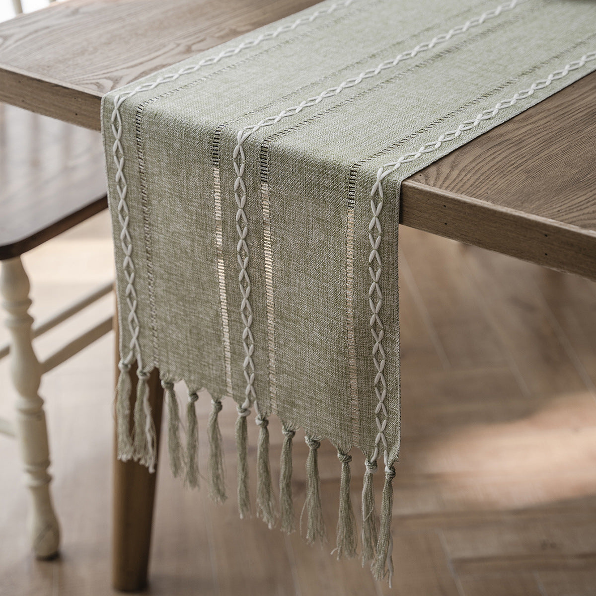 Elegant White Christmas Table Runner with Braided Design and Tassels 3