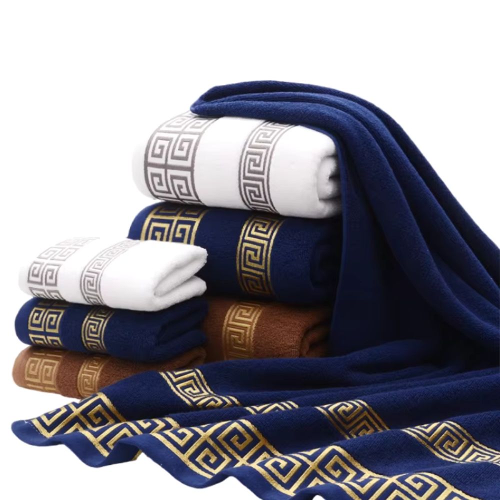 Multi-color towel display showing navy white and rust with embroidered borders