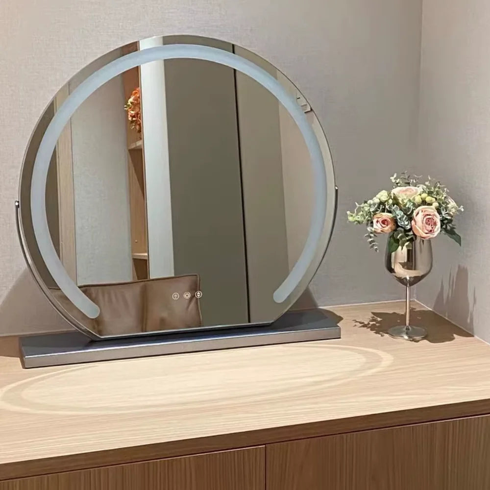 Front view of gold LED mirror with touch controls and roses