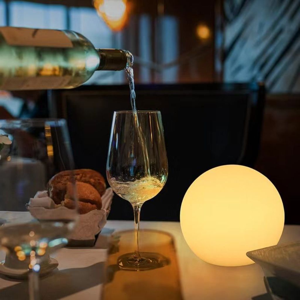 LED moon globe lamp warm yellow light dining table dinner setting