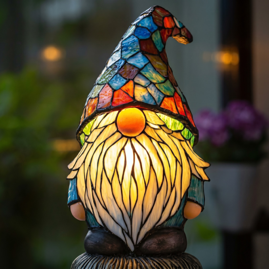 Gnome-shaped stained glass night light with multicolored hat and white beard