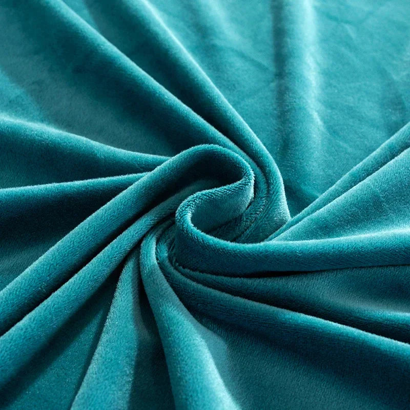Teal velvet fabric swatch showcasing plush pile and stretch quality