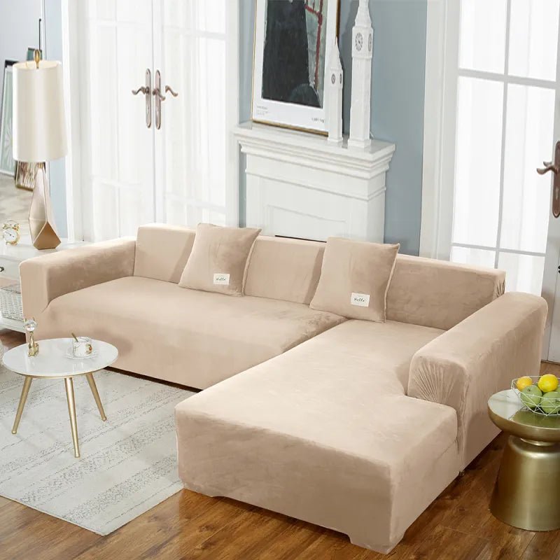Soft beige stretch velvet sofa cover on sectional with 'hello' tags