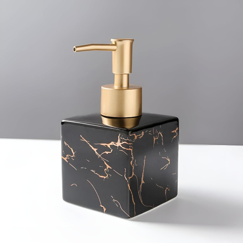 Black ceramic soap dispenser with glossy gold marble finish