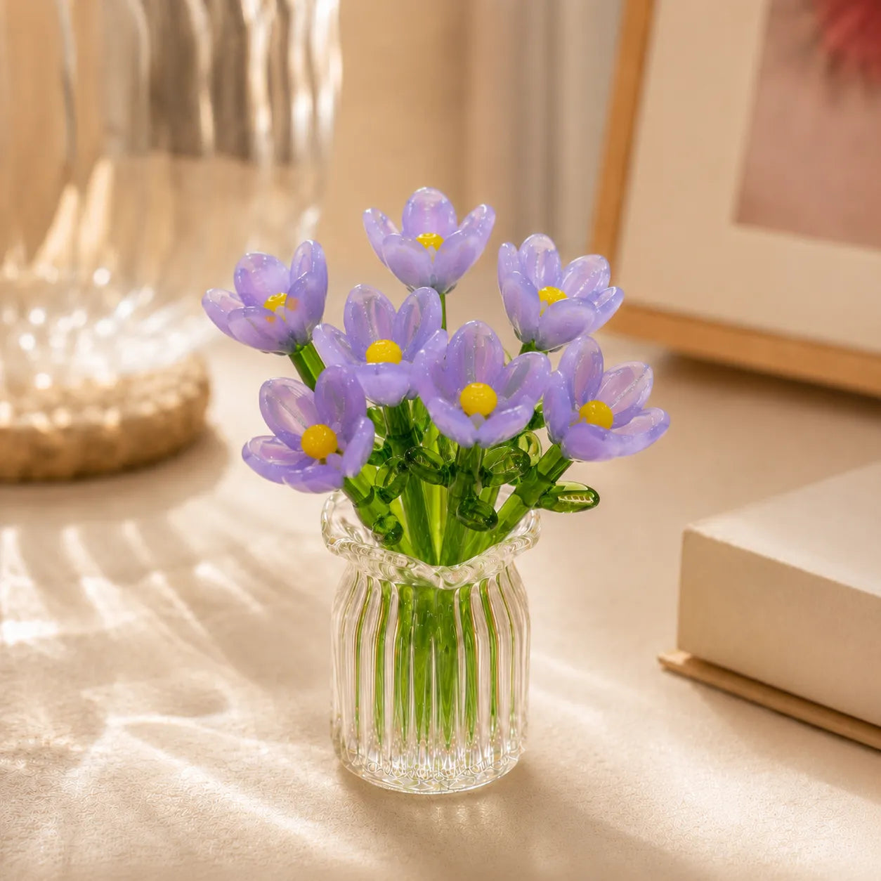 Lavender-purple hand-blown glass tulip bouquet in ribbed clear vase
