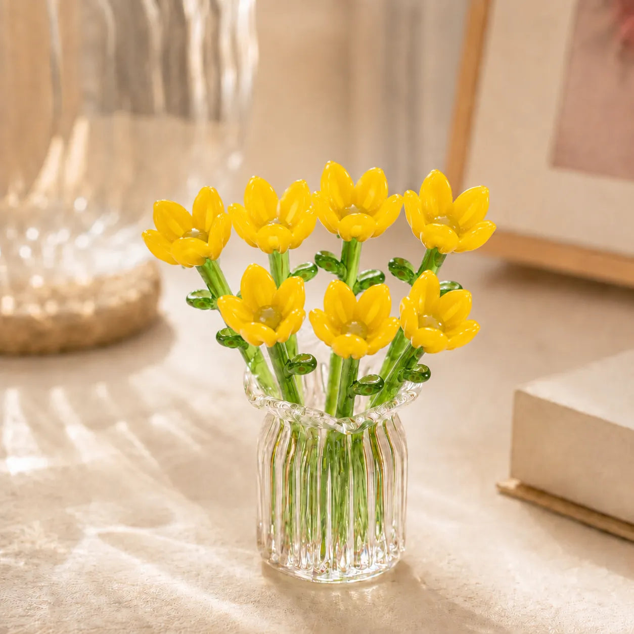 Bright yellow hand-blown glass tulip arrangement with fluted vase