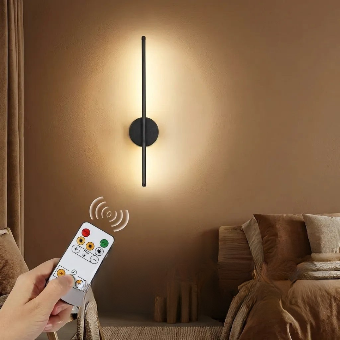 Black LED wall light with remote control dimming feature