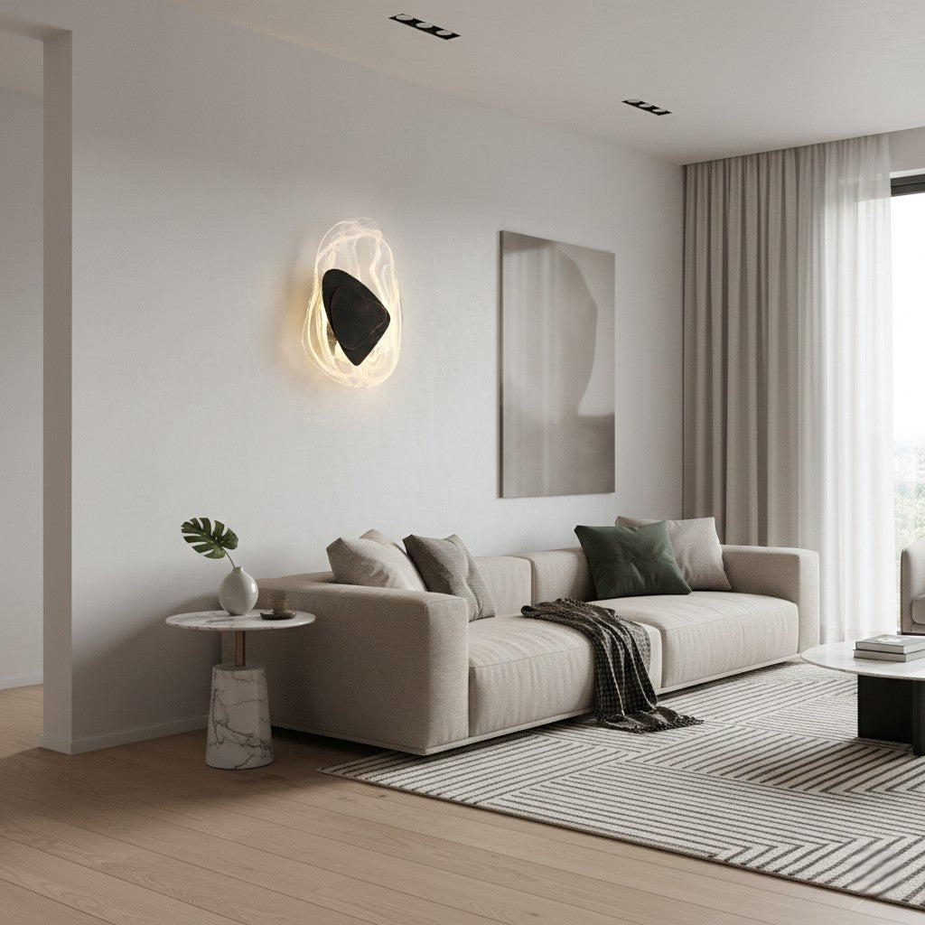Ambient lighting from organic glass wall lamp with black inserts in modern living room