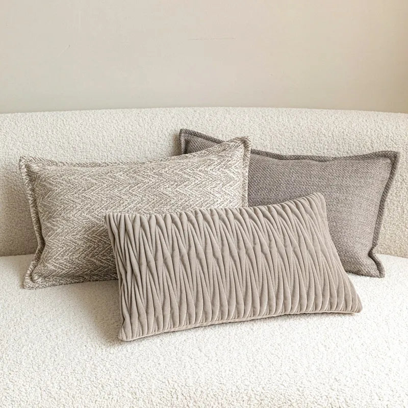 Set of beige pleated velvet and gray woven lumbar pillows