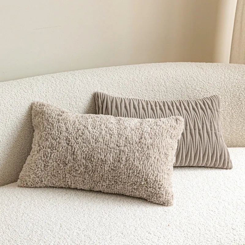 Beige high-pile shaggy and taupe wavy pleated lumbar cushions