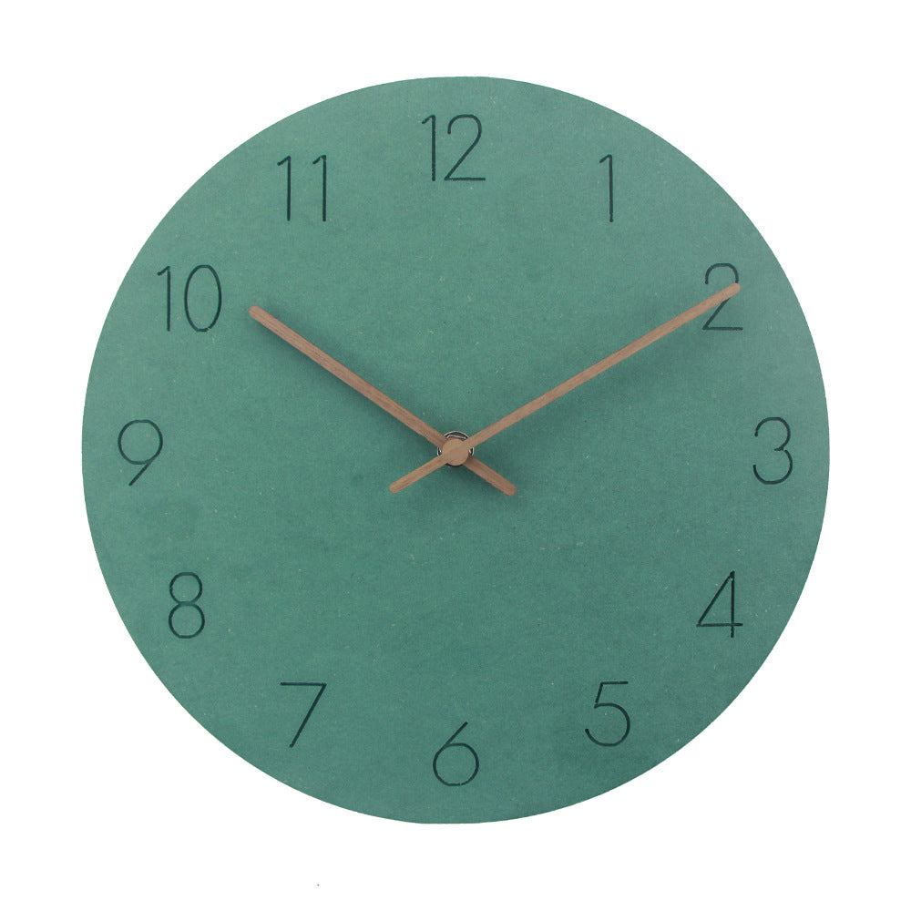 Teal-green textured wall clock with three slender wooden hands