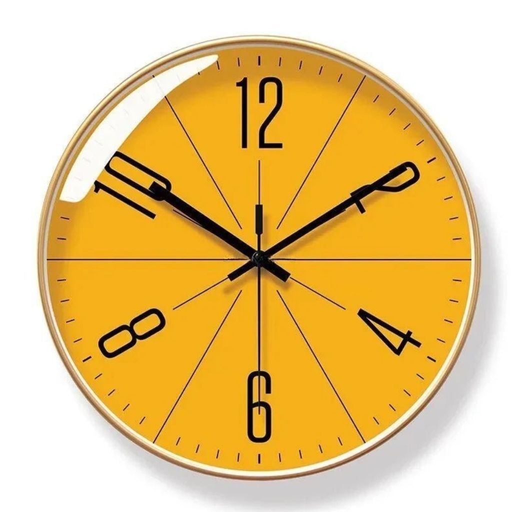 Front view of round yellow wall clock featuring thin gold rim and protective glass cover