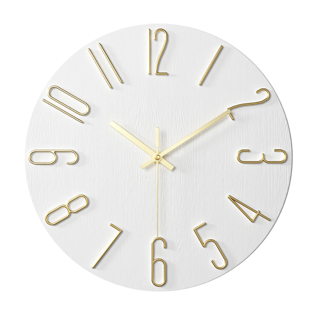 White minimalist wall clock with textured face and gold wire numerals