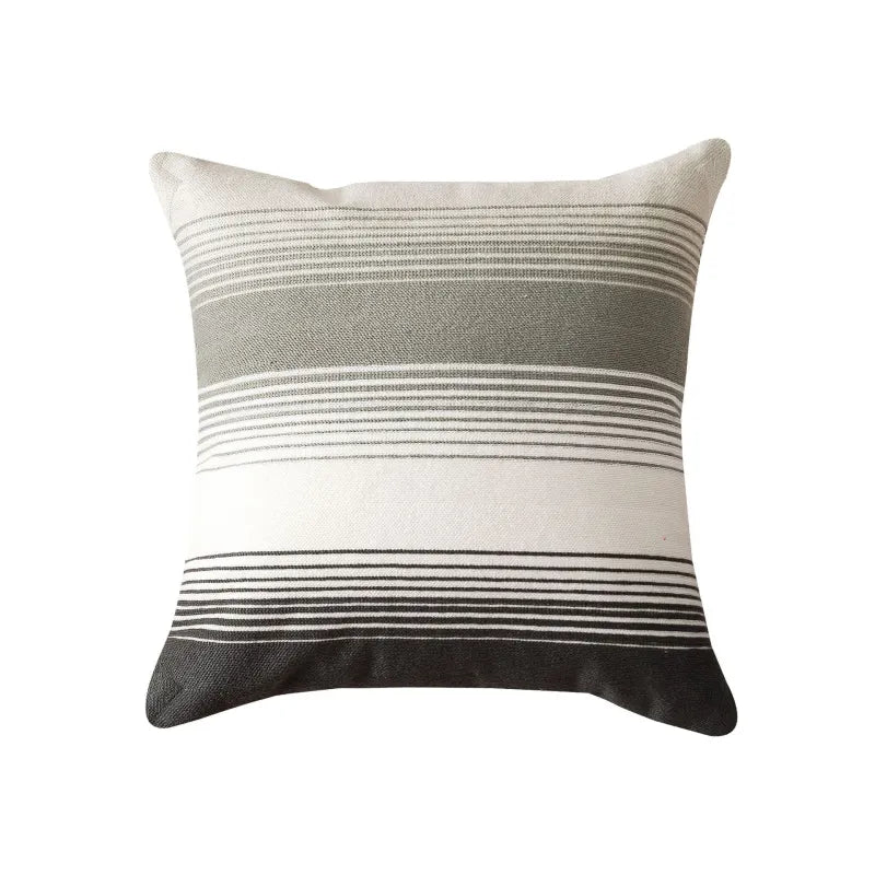 Black and gray horizontal striped cotton canvas pillow with textured off-white base