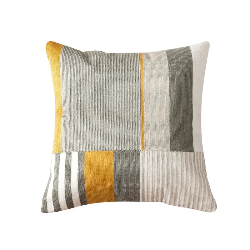 Patchwork style cotton canvas pillow with mixed ribbing and striped panels