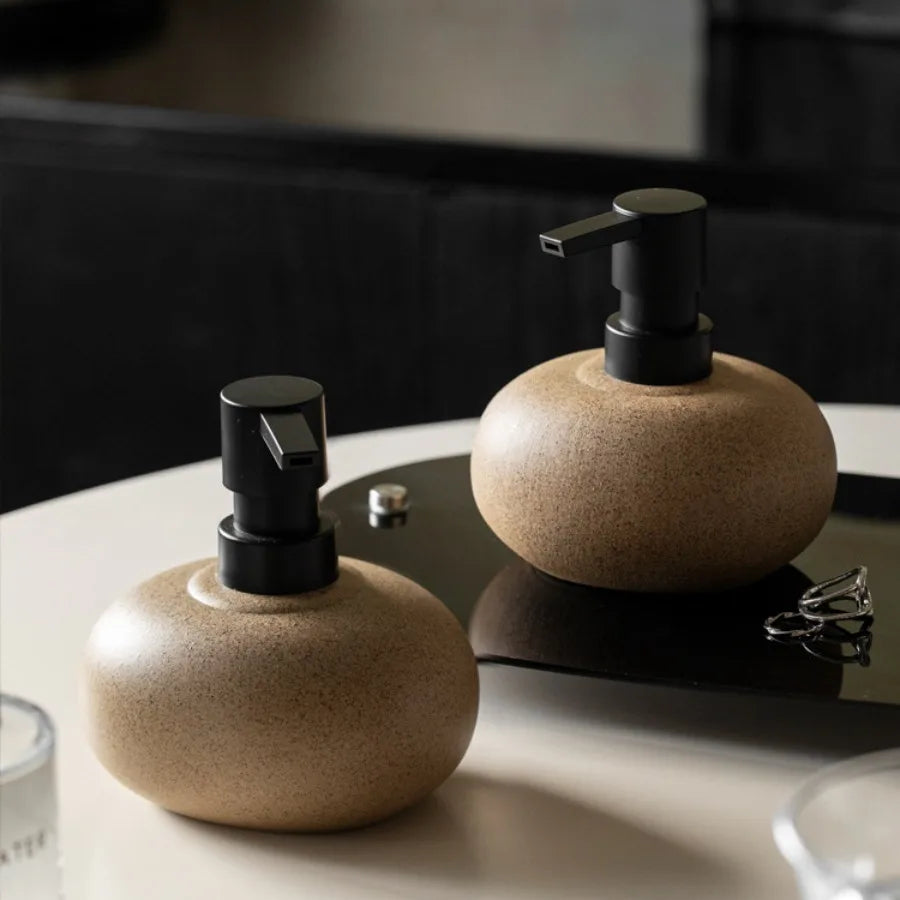 Nordic Ceramic Soap Dispenser – Stylish Pebble Design with Matte Black Pump 1