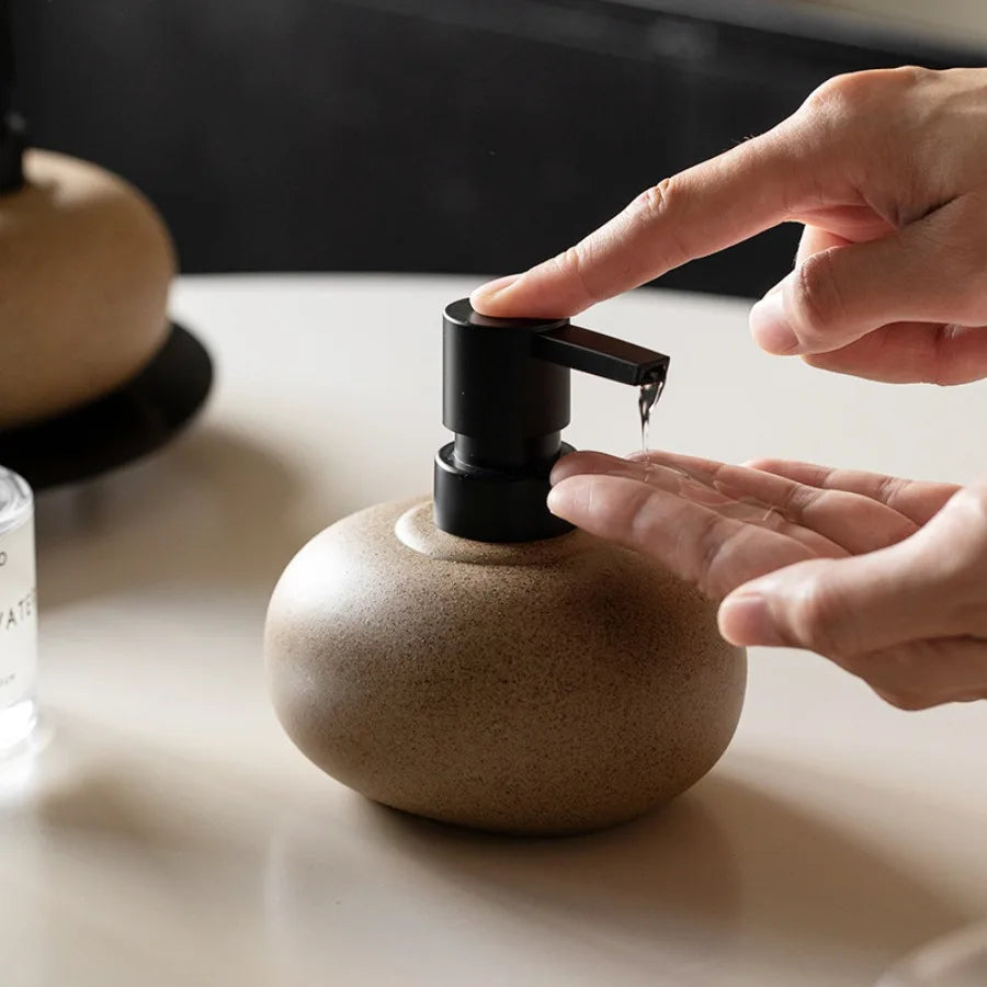 Nordic Ceramic Soap Dispenser – Stylish Pebble Design with Matte Black Pump 4