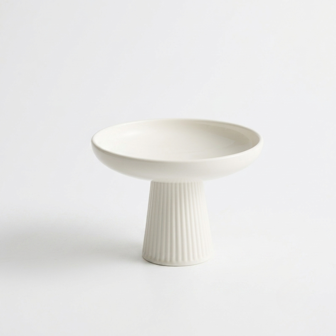Glossy white porcelain footed compote bowl with ribbed stem