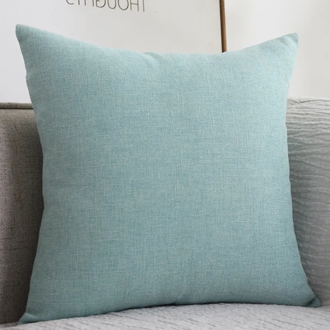 Light teal solid linen throw pillow with fine textured weave