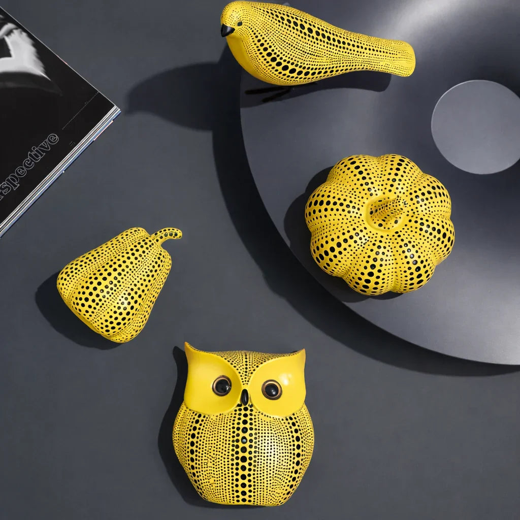 Kusama inspired yellow polka dot animal sculptures with magazine lifestyle styling