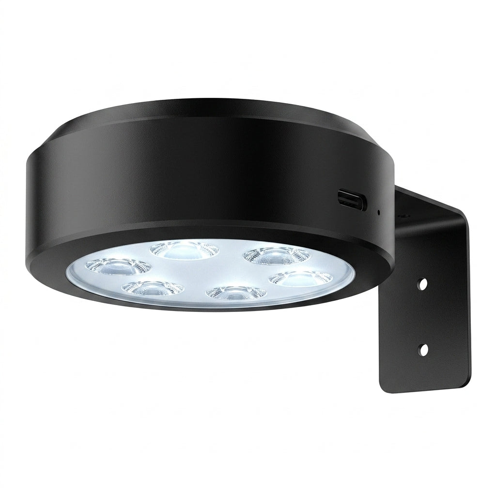 Black magnetic rechargeable puck picture light with USB-C port and LED emitters