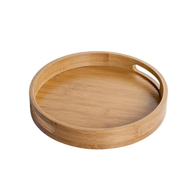 Natural wood circular serving platter featuring symmetrical oval handle cutouts