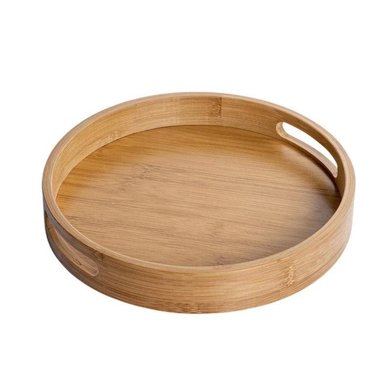 Single round bamboo serving tray with raised rim and integrated handles on white background