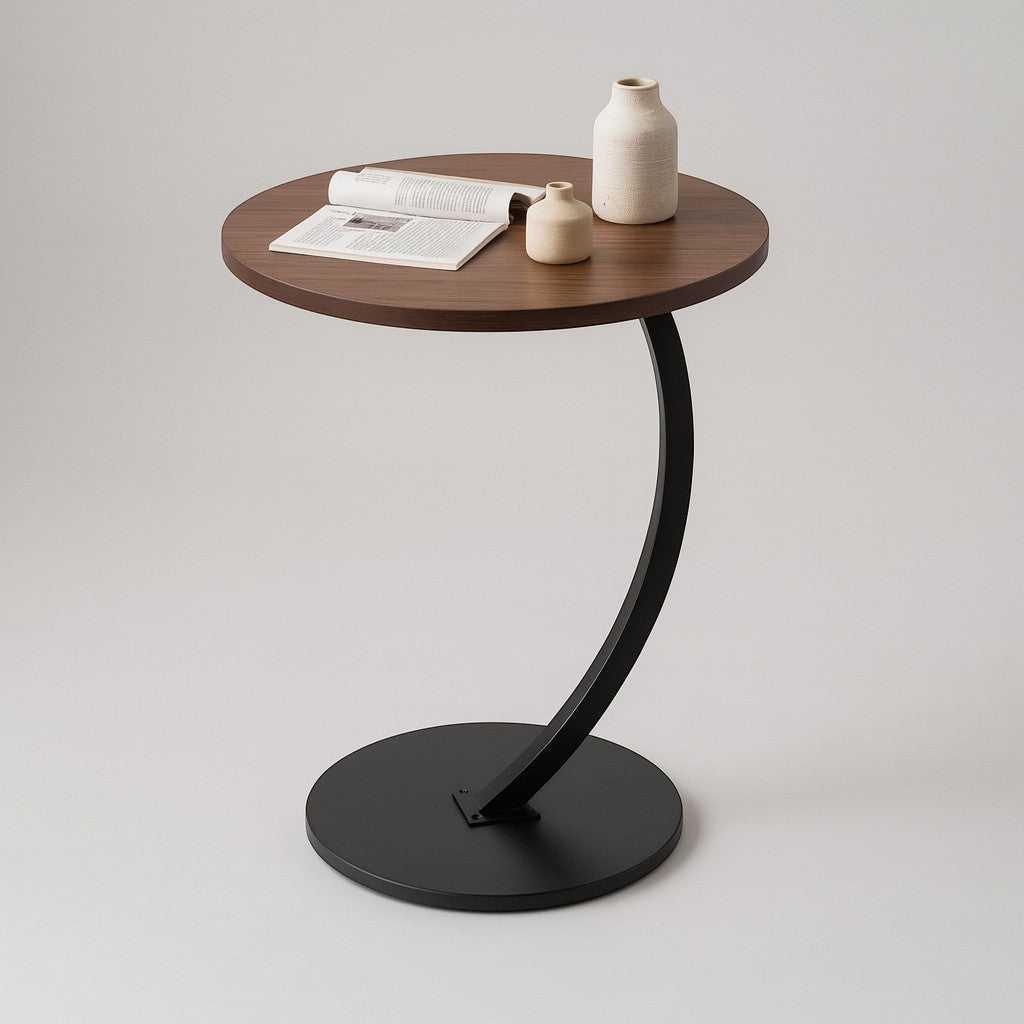 Black metal base round side table with visible bracket detail