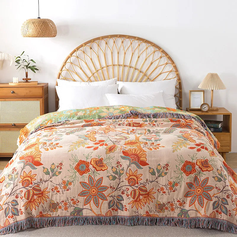 Full view of rustic floral cotton sheets with fringe on cozy bedroom setup