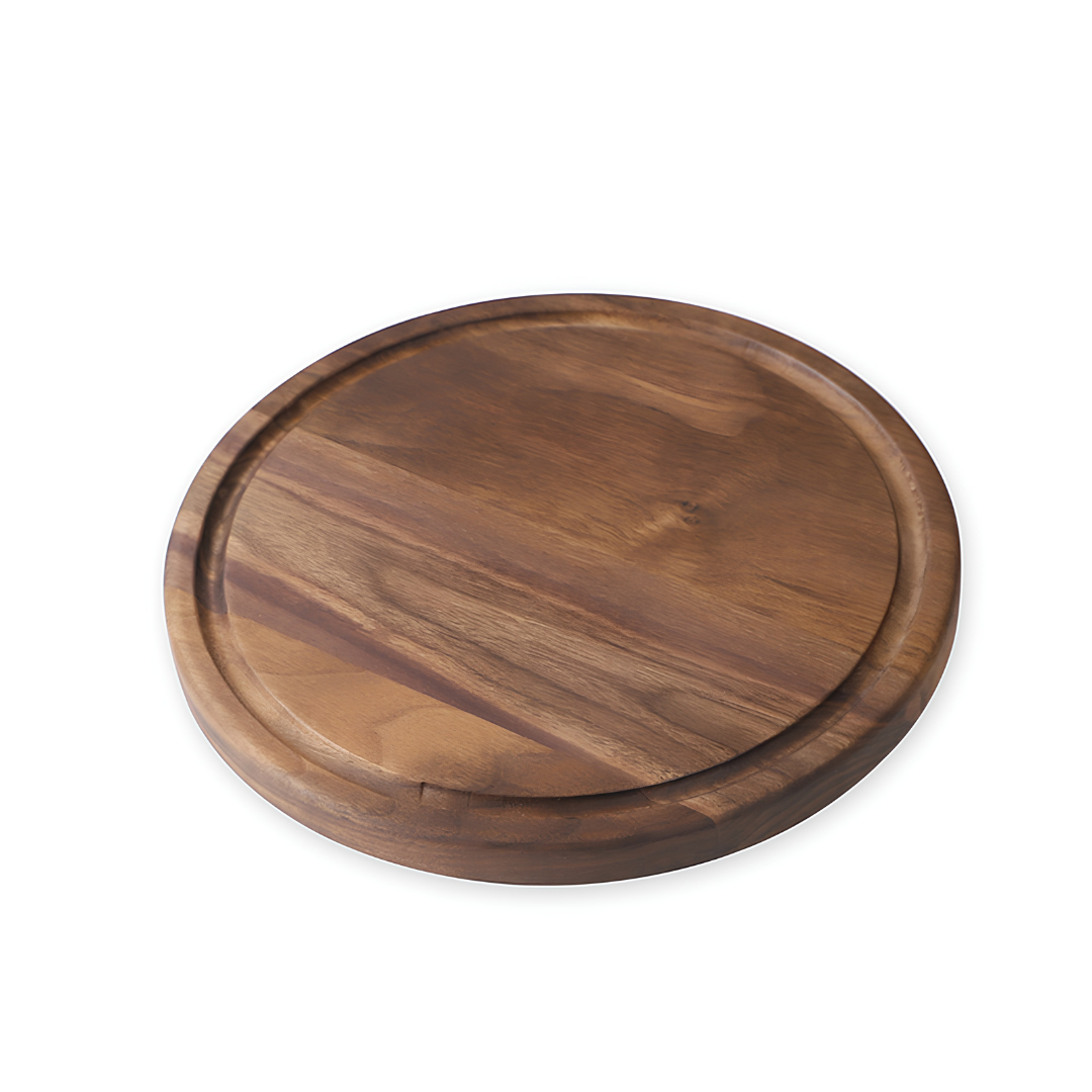 Dark brown round wooden cutting board with perimeter juice groove