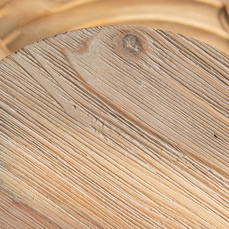 Diagonal wood grain pattern and natural knot on rustic circular stand top