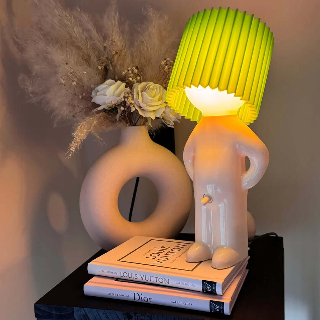 Green to yellow gradient pleated shade on whimsical ceramic night light