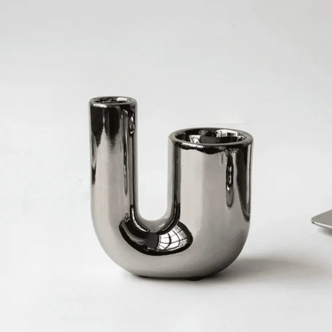 U-shaped dual taper and tealight chrome candle holder overview