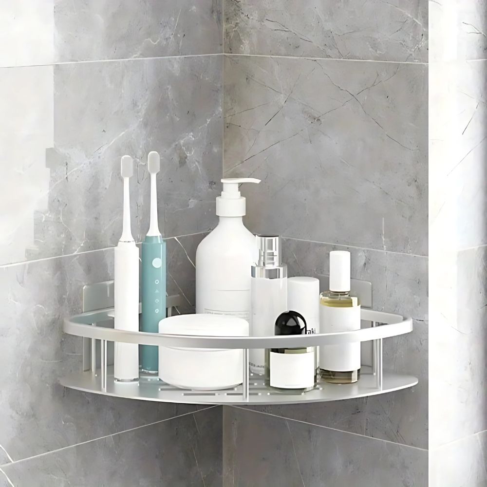 Silver brushed aluminum curved shower shelf with open-frame design and slatted tiers
