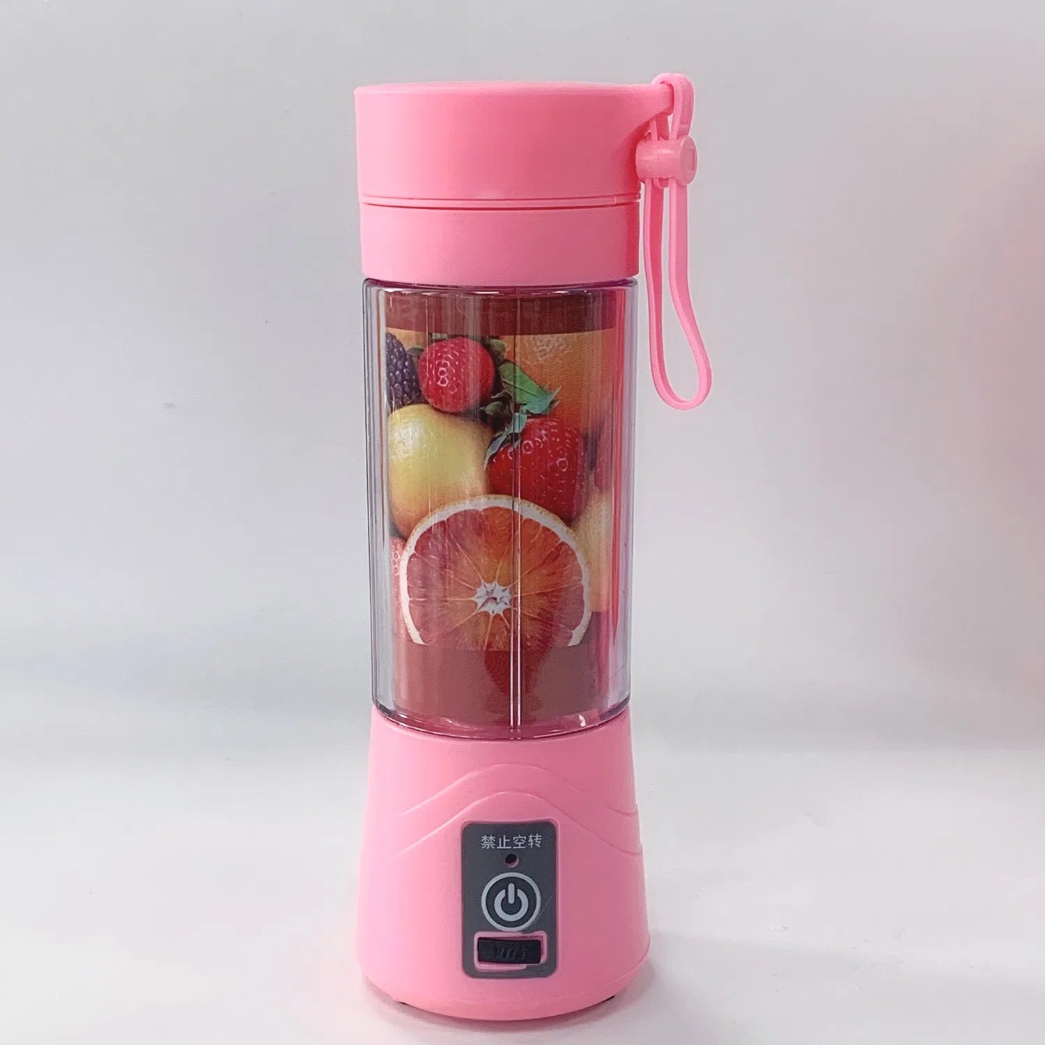Pink rechargeable juicer cup with fruit graphics and anti-idling control panel