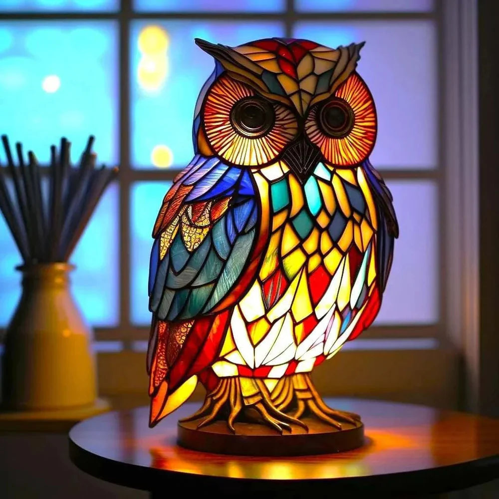 Owl perched stained glass table lamp with carved branch feet