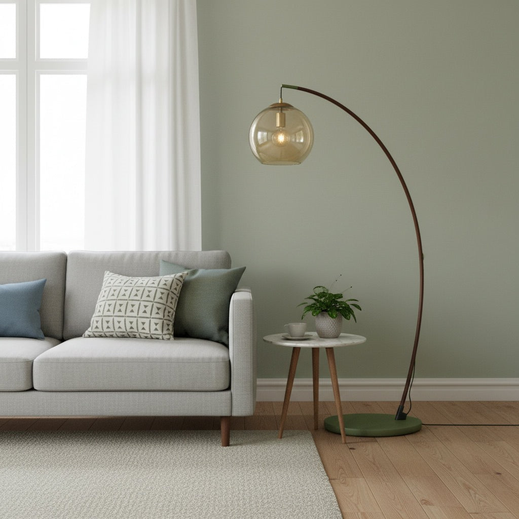 Maintained House Amber Globe Arc Floor Lamp - By a sage green wall
