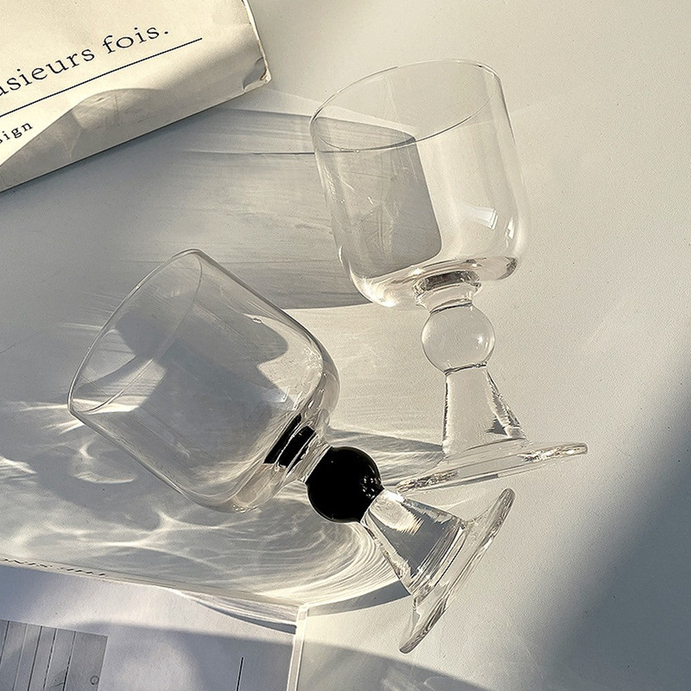Maintained House Ball Stem Wine Glass Set - Clear and Black side by side