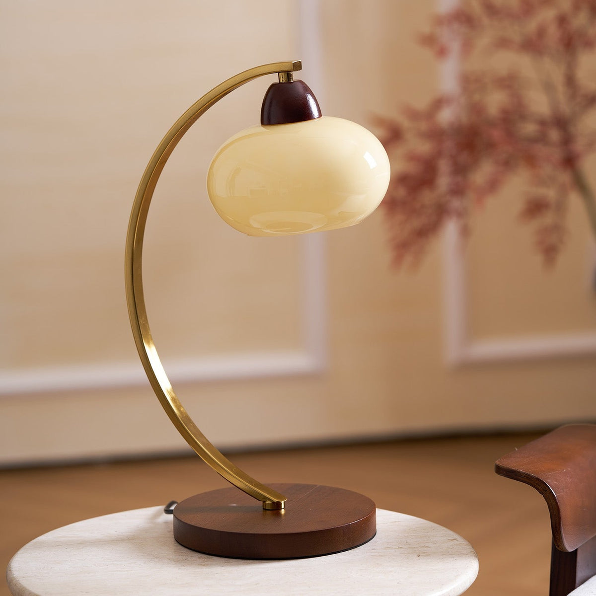 Maintained House Curved Brass Arm Table Lamp - On a side table