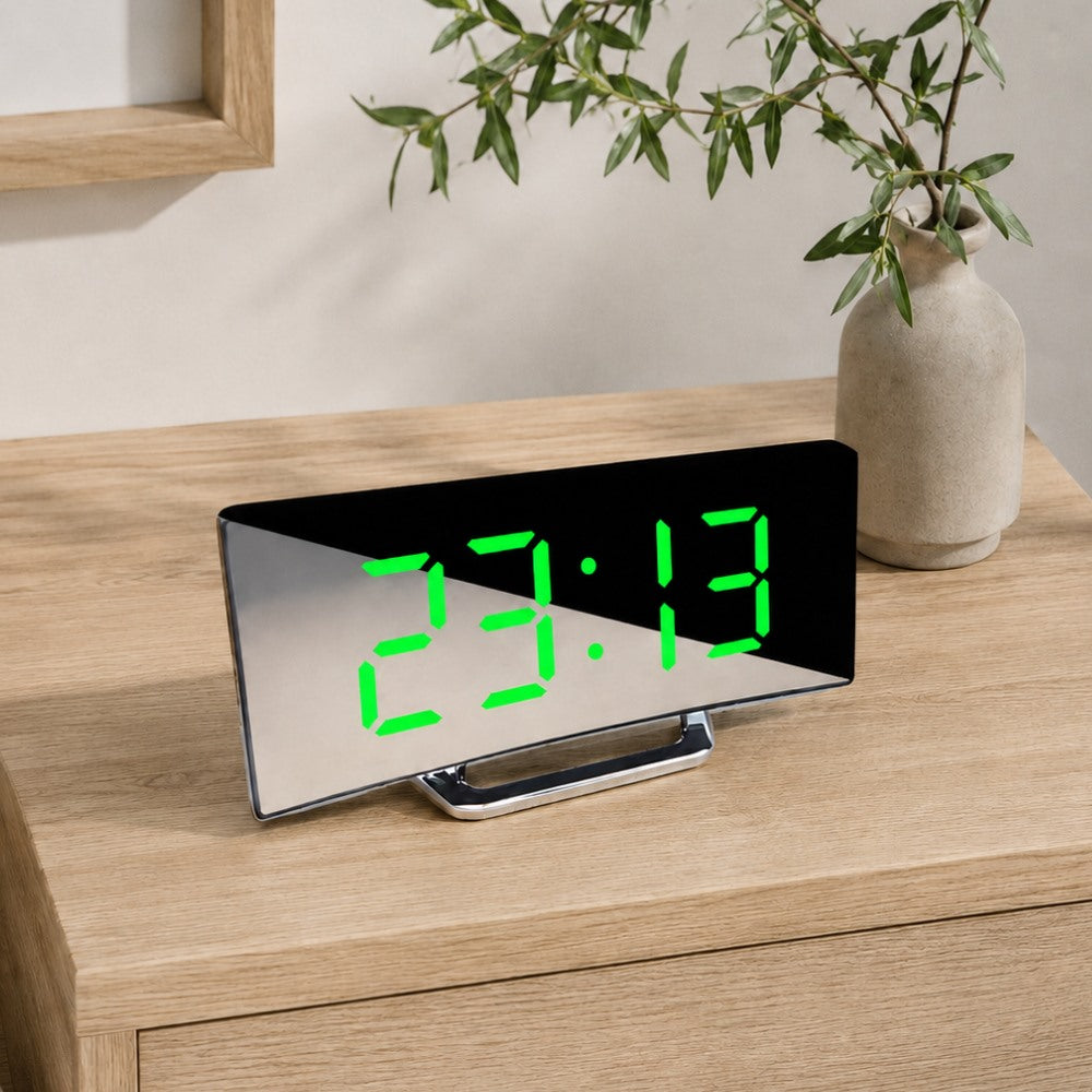 Maintained House Curved Mirror LED Alarm Clock - Green display on a desk