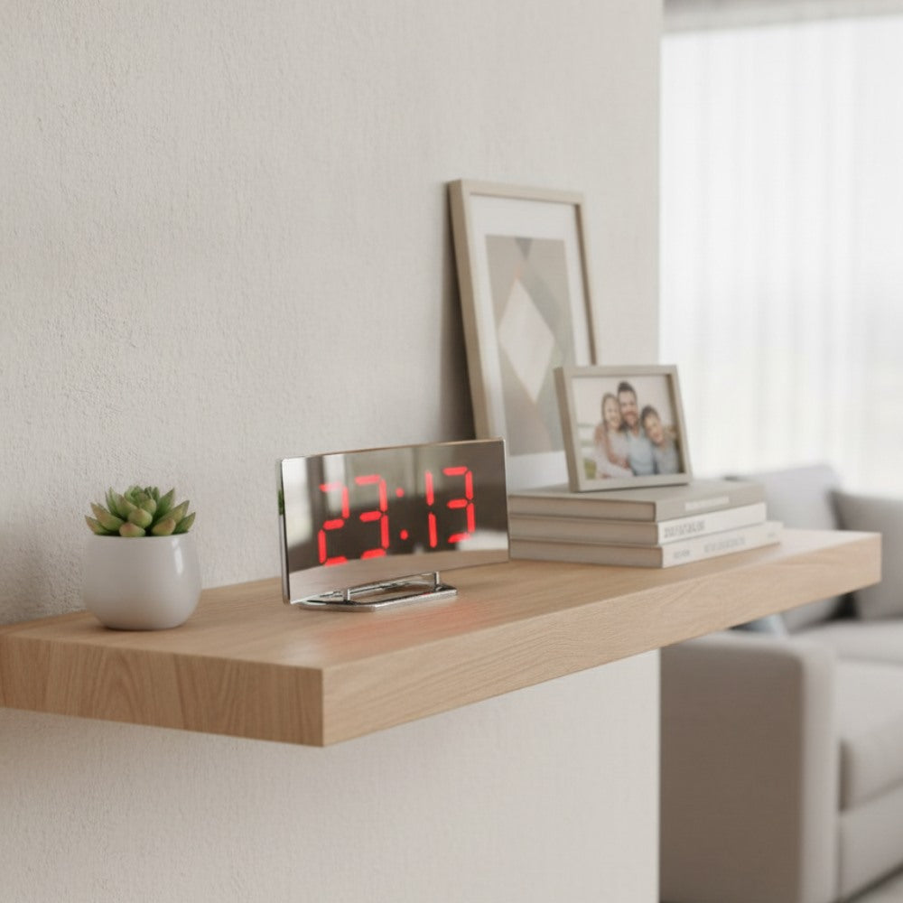 Maintained House Curved Mirror LED Alarm Clock - Red display on a wall shelf