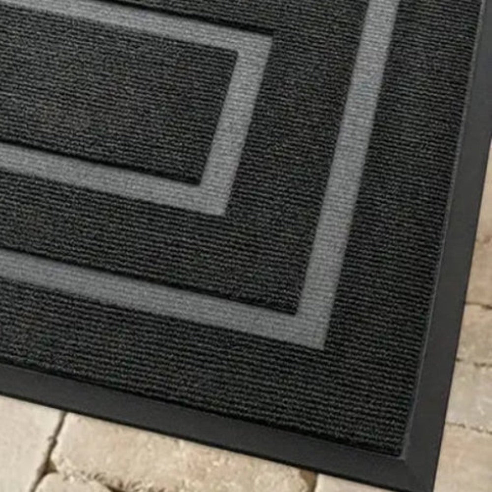 Maintained House Double Border Ribbed Doormat - Black corner with the rubber edge