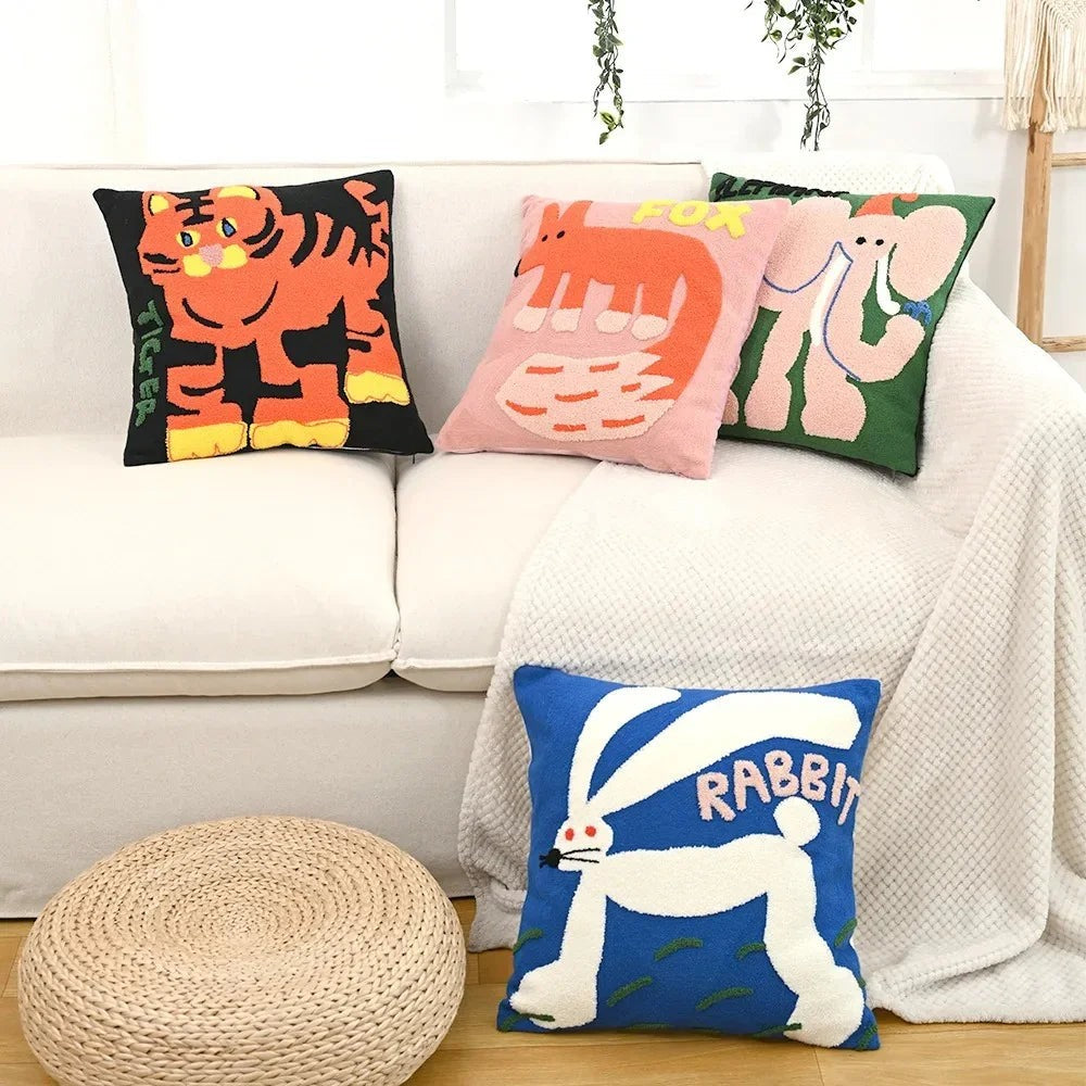 Maintained House Embroidered Animal Pillow Cover - Four designs on a sofa