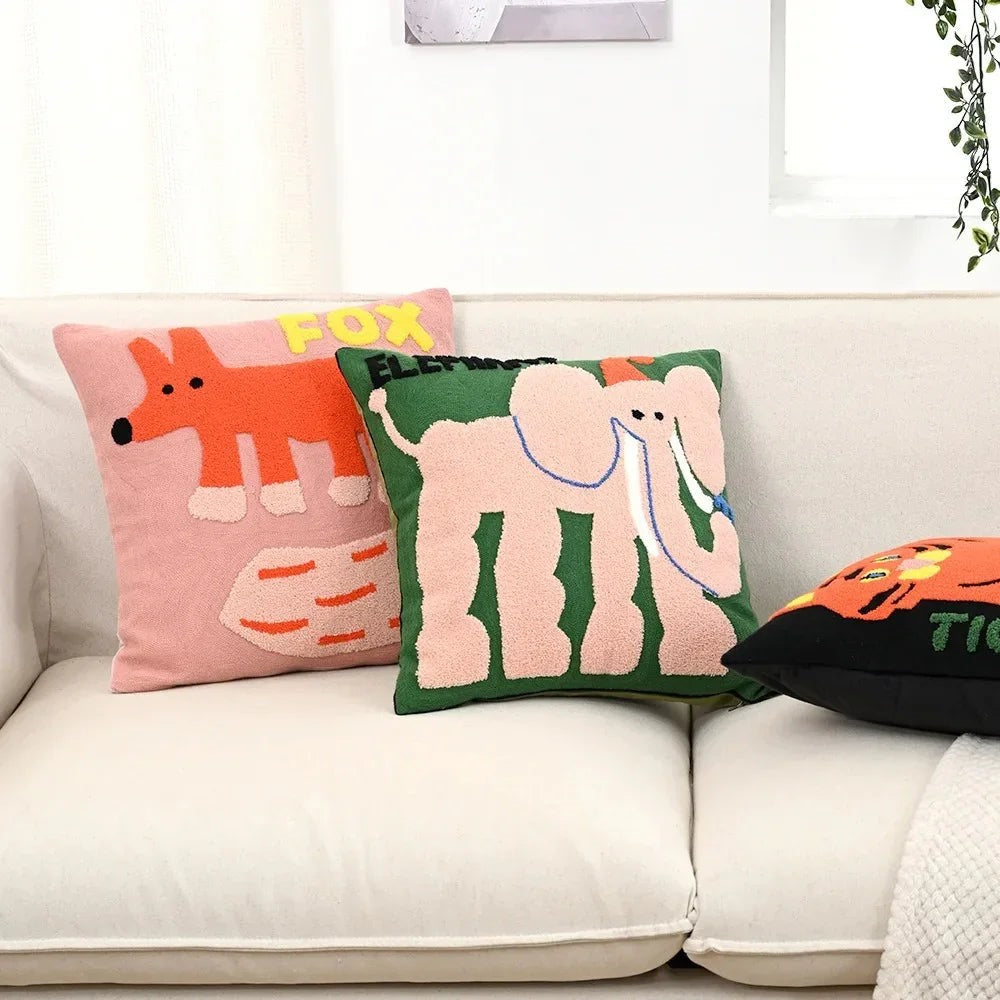 Maintained House Embroidered Animal Pillow Cover - Fox, Elephant and Tiger on a sofa